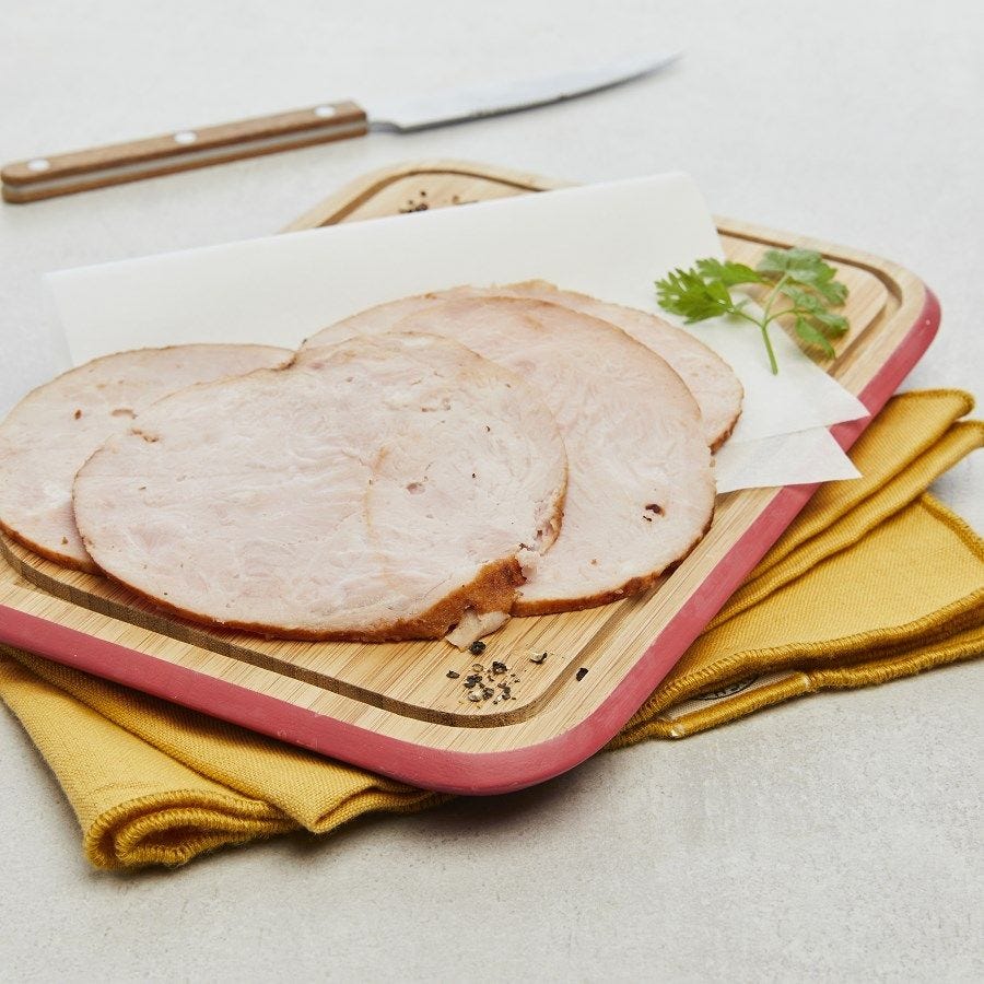 Rôti de porc cuit supérieur tranché