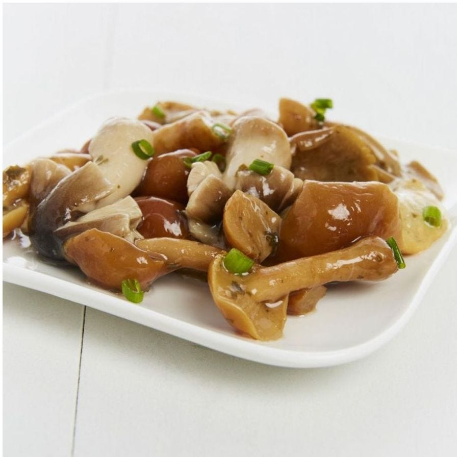 Fantaisie gourmande de champignons marinés à l'huile